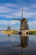 windmill near the water in the netherlands