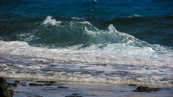 strong ocean waves on the beach