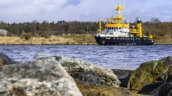 Landscape with the research ship in the water