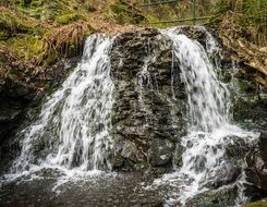 noisy waterfall on a cliff