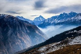 panorama of a mountain range in a blue haze