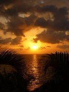 sunset over the island of Roatan in the Caribbean