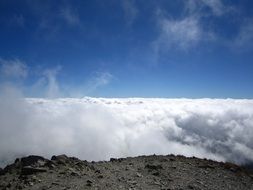 thick clouds at the top of the mountain