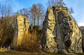picturesque rocks in forest at winter, Poland, Malopolska