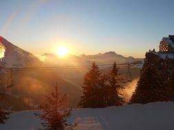 sunset on the background of the mountain in winter