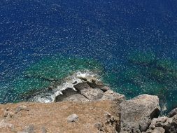 deep blue and green Sea Water, view from Rock on Coast, greece