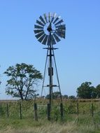 fence near an ancient windmill