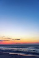 colorful sunrise over the ocean on the horizon