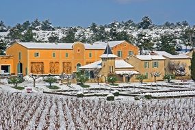 Landscape of beautiful Laquirou field and houses in snow
