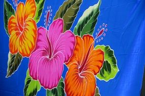 colorful big flowers on a blue towel