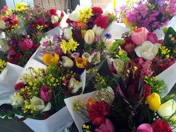 bouquets of colorful flowers on the market