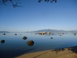 Stones in sea at coast