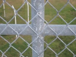 Picture of metal Fence on a field