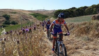 young people Cycling on Mountain side