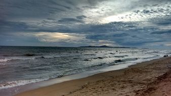 Beach and sea at stormy evening, Thailand