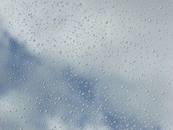 lot of the raindrops on glass and clouds