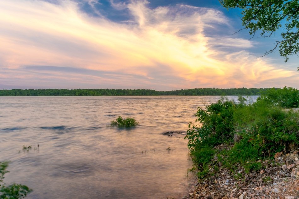 Colorful landscape with the clouds and lake