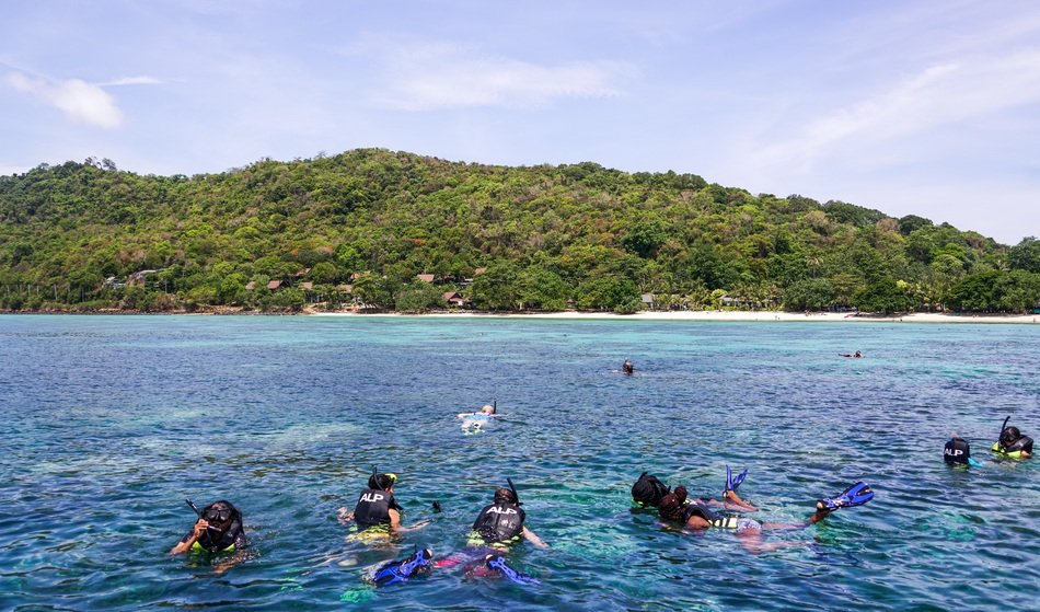 divers off the coast of thailand