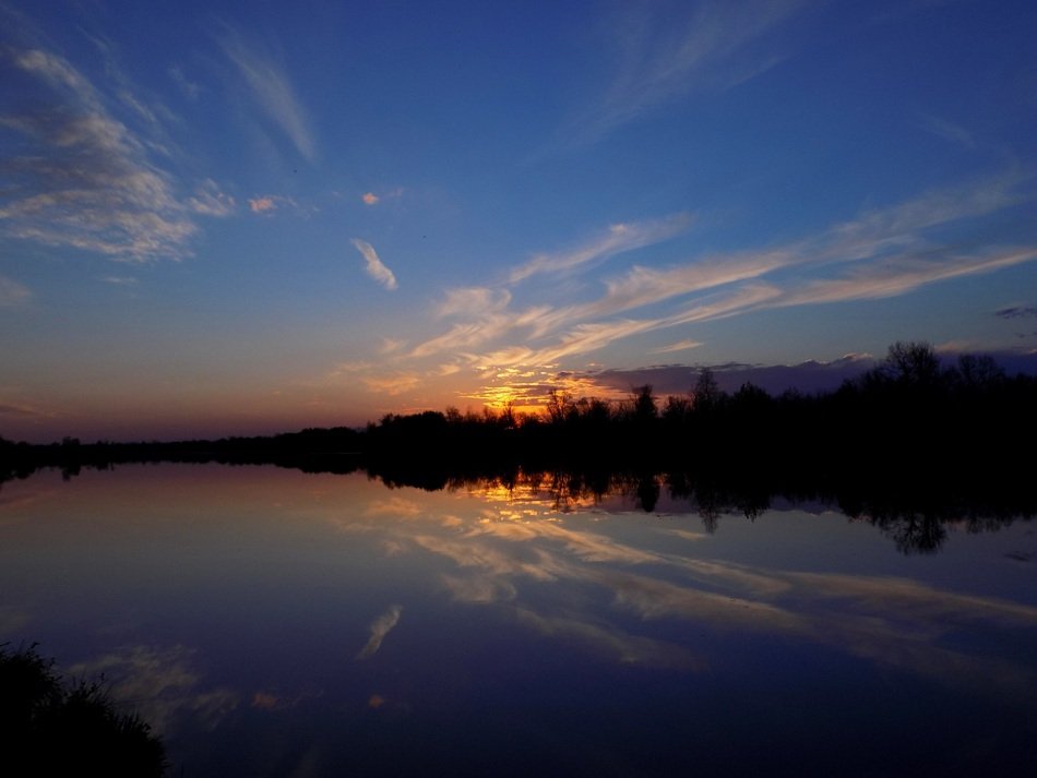 sunset over the river at dusk