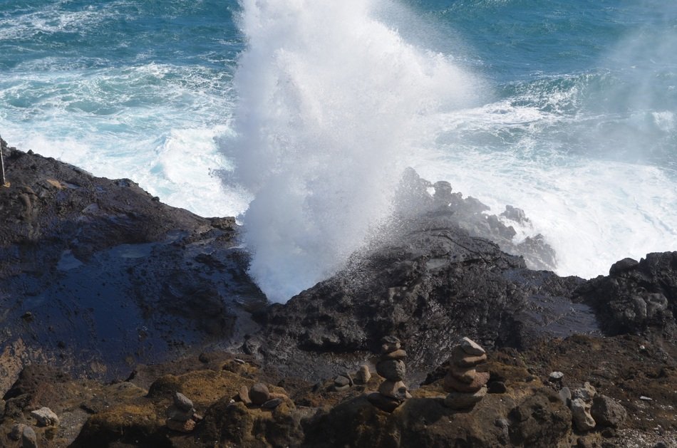 splashing water on the coast of hawaii