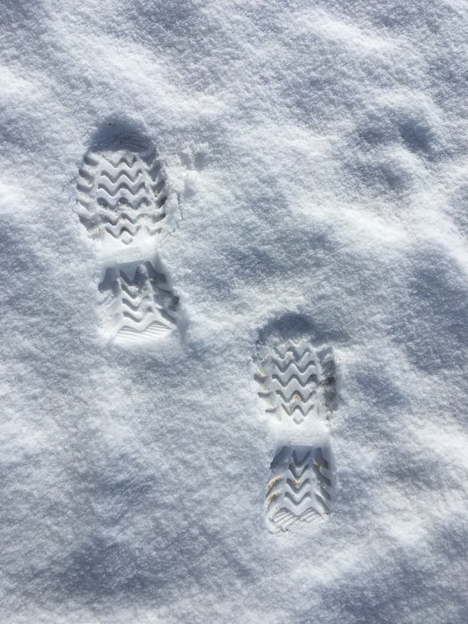Footprints on the snow in the winter