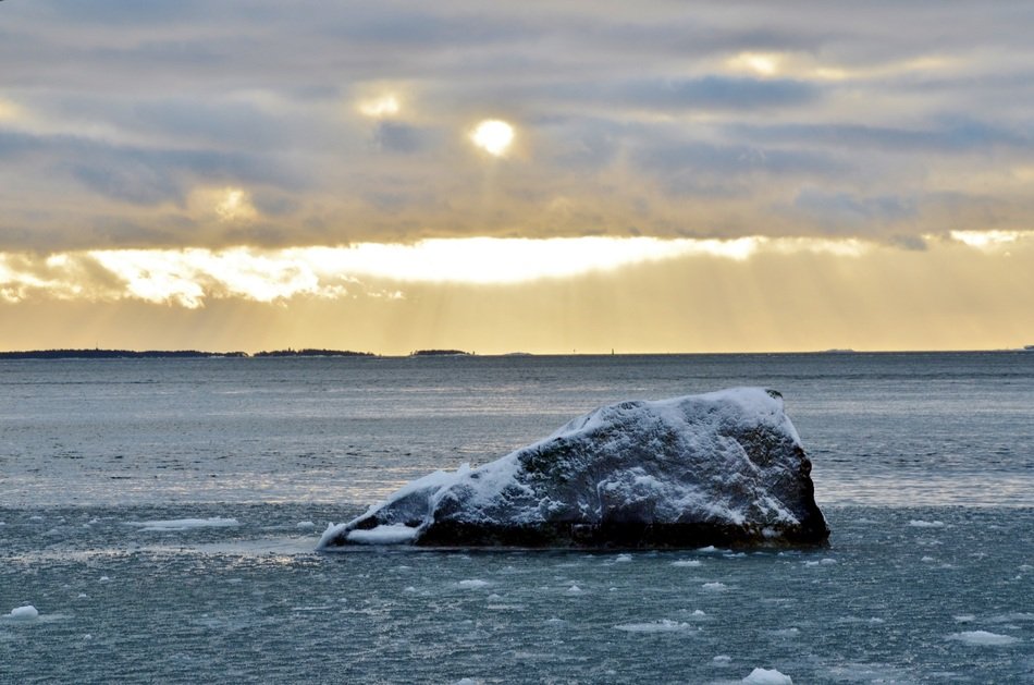 frozen lake lightened by the sun