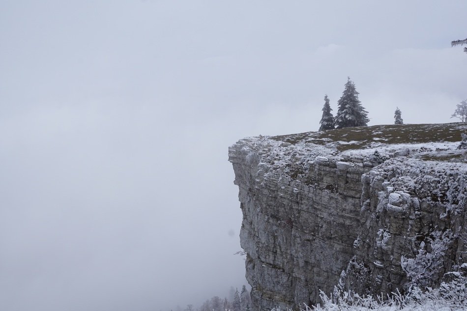 panorama of the creux du van in the winter haze