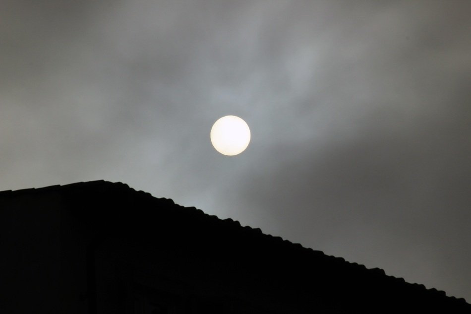 foggy sun over the mountain