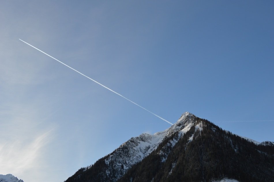 Aircraft and snowy mountain in winter