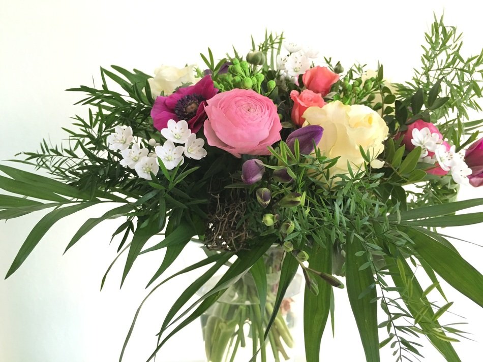 bouquet of flowers with palm leaves