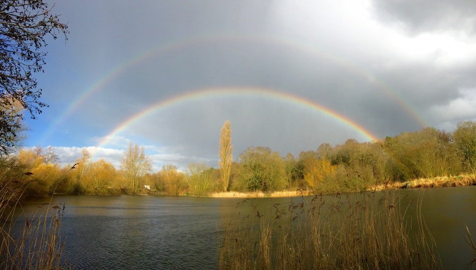 double rainbow over the lake
