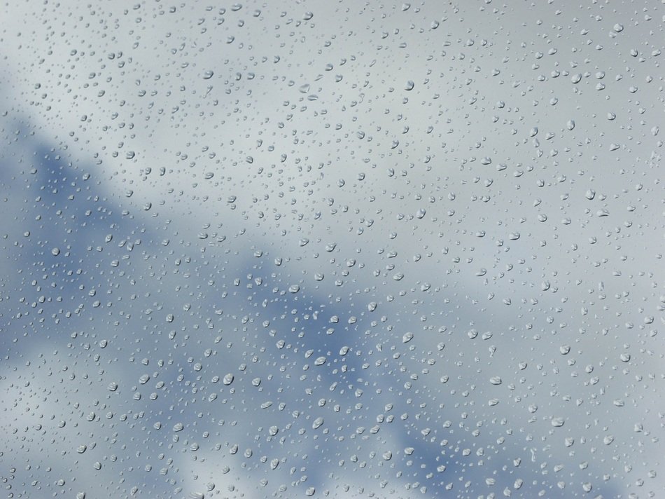 lot of the raindrops on glass and clouds