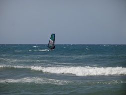 sailing boat on the ocean waves