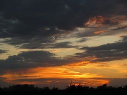 orange sky during sunset on the horizon