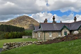 beautiful house at the foot of a mountain in northern ireland