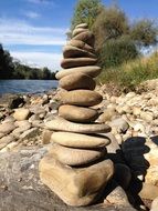 closeup view of folded pebbles by the river