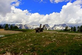 wooden bench on the observation deck in the picturesque alps