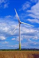 summer windmill against the blue sky