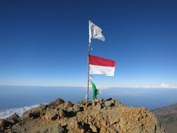 flags on top of stratovolcano Rinjani