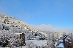 river near a snowy mountain