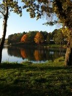 pond with reflection of autumn trees