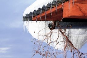 icicles and snow on the roof