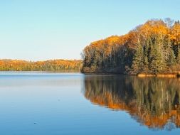 tranquil lake in the autumn evening