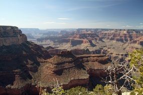 bright sunny sky over the Grand Canyon on the colorful landscape in Arizona