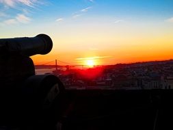 cannon at dusk at sunset