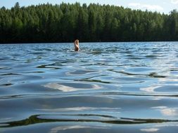 swimming in the pond