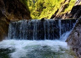 wide waterfall among the rocks