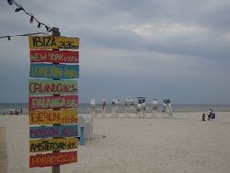 colorful information boards at Baltic Sea beach