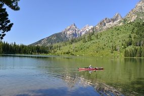 canoe on a picturesque lake in Grand Teton National Park