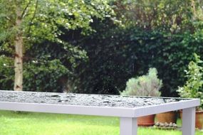 raindrops on a white table